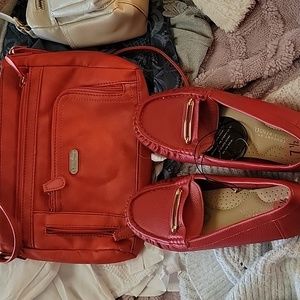 Red shoes and mitching bag.